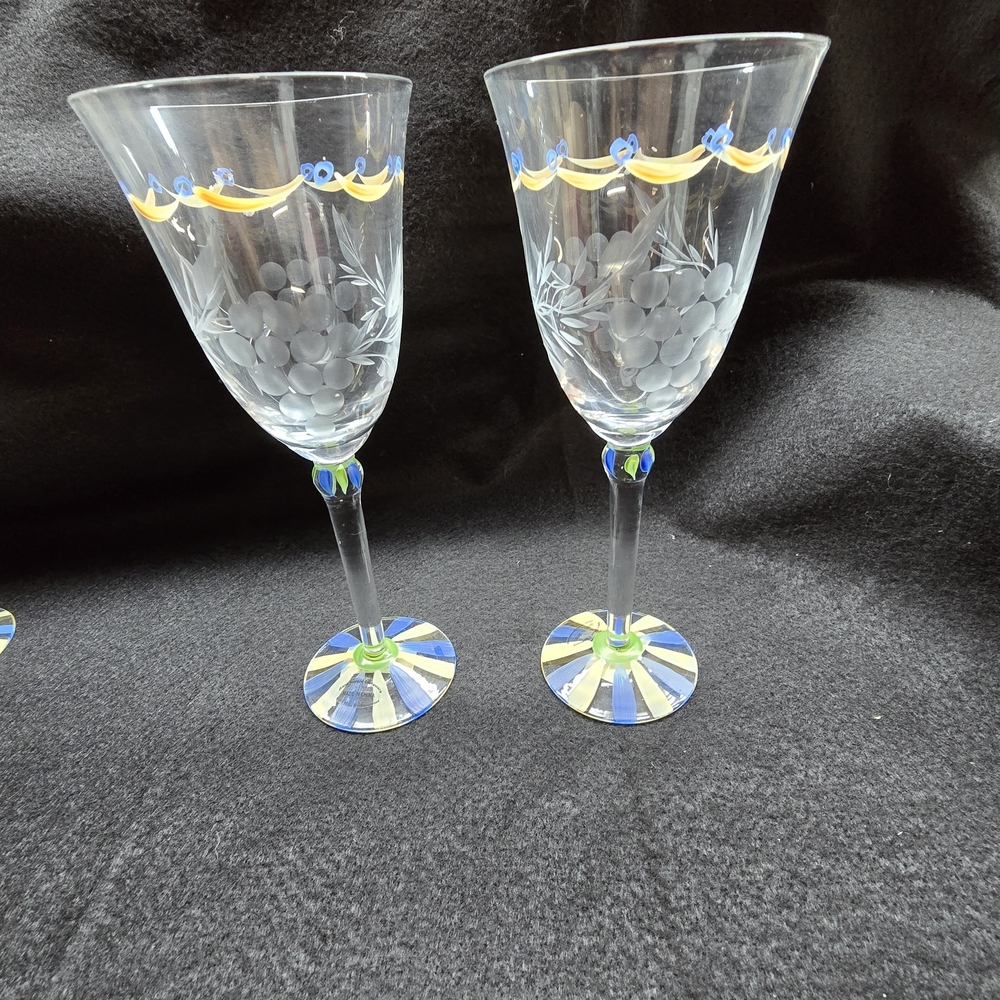Elegant Crystal Wine Glasses with Blue and Yellow Accents